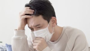 asian man sick with mask