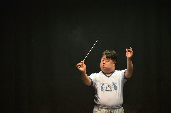 zhou zhou orchestra conductor down syndrome