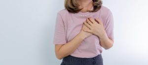 Woman heart pain - cardiovascular health