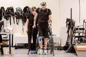 revolutionary brain implants help paralyzed man walk again