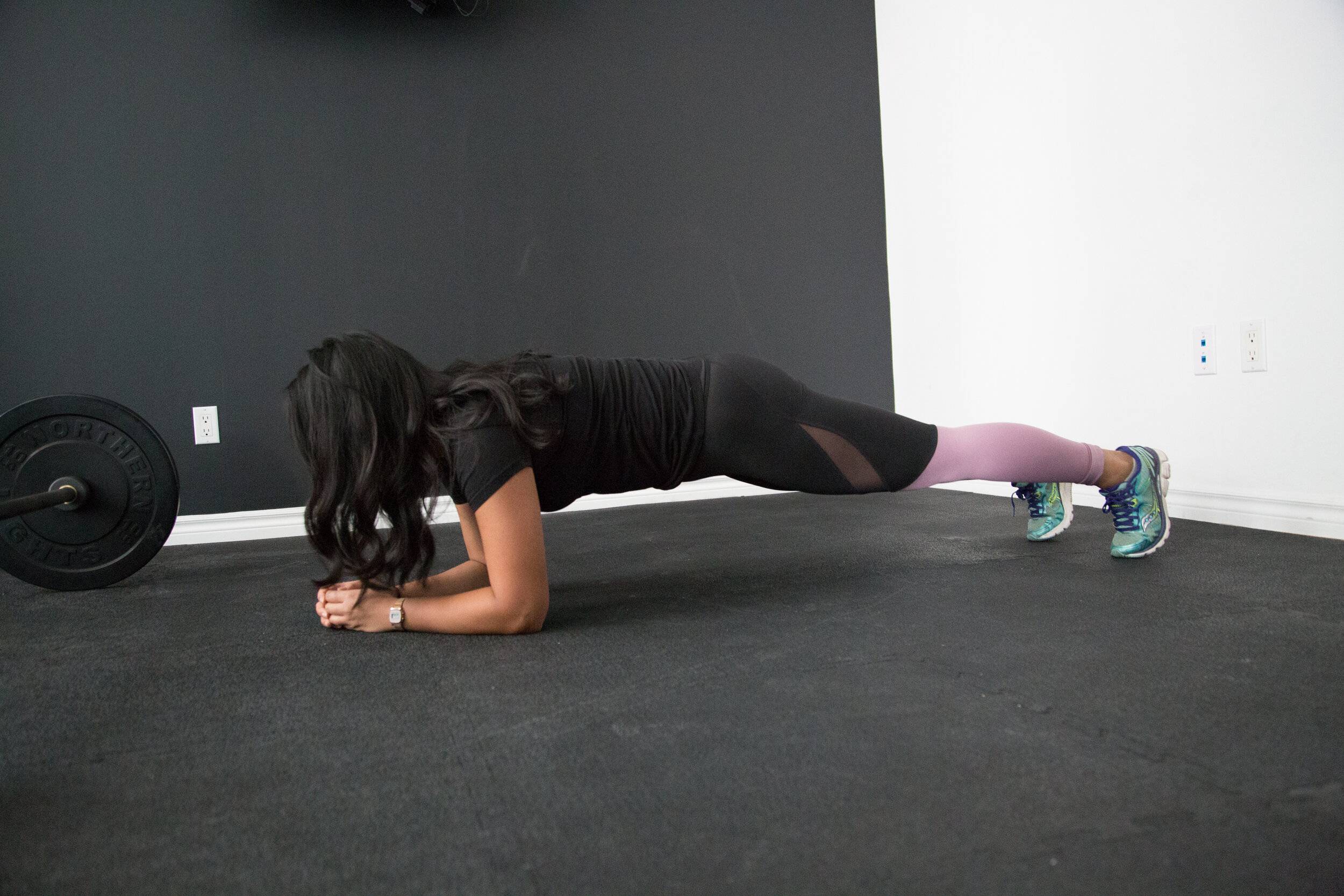 Girl planking on the floor