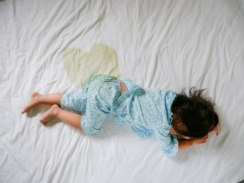 Bedwetting,,child,Pee,On,A,Mattress,little,Girl,Feet,And,Pee