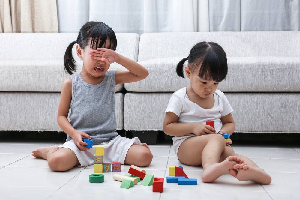 Asian,Chinese,Little,Sisters,Struggle,For,Blocks,On,The,Floor