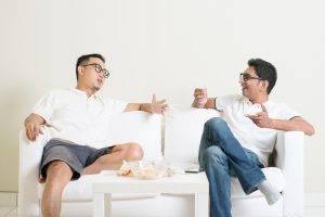 Men,Talk,Concept.,Two,Young,Male,Friend,Sitting,On,Sofa