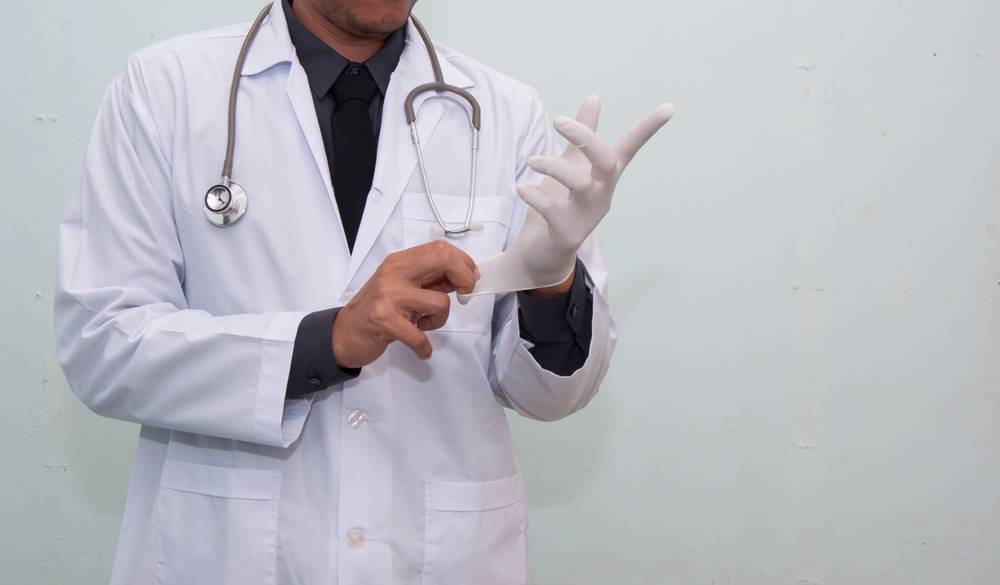 Doctor,Is,Wearing,Medical,Glove